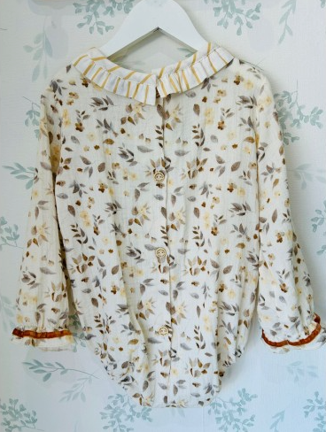 PELELE BEBÉ ANDRÓMEDA