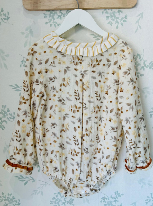 PELELE BEBÉ ANDRÓMEDA